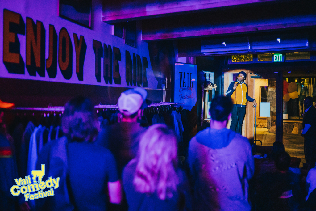 A wall painting encourages folks to Enjoy The Ride as surprise headliner Al Jackson from HBO and Comedy Central performs at a late show during the 2022 Vail Comedy Festival