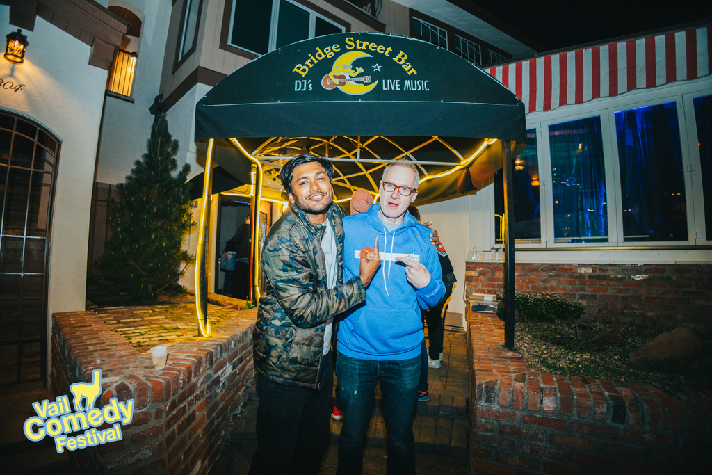 Usama Siddiquee and Mark Masters joke it up outside Bridge Street Bar at the 2022 Vail Comedy Festival